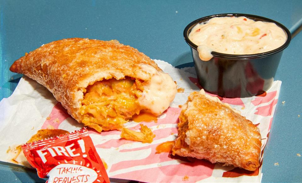 The Cheesy Chicken Crispanada being sold exclusively in Knoxville for a limited time is Taco Bell's take on an empanada. It costs $3.49 on its own and $8.49 as a meal.