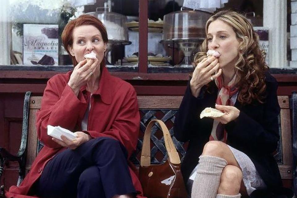 <p>After airing the scene with Carrie and Miranda in season 3, episode 5 the bakery had to hire a bouncer because the spot <a href="http://www.amny.com/secrets-of-new-york/secrets-of-magnolia-bakery-cupcakes-carrie-bradshaw-and-beyond-1.11744934" rel="nofollow noopener" target="_blank" data-ylk="slk:became so popular;elm:context_link;itc:0;sec:content-canvas" class="link ">became so popular</a>. </p>