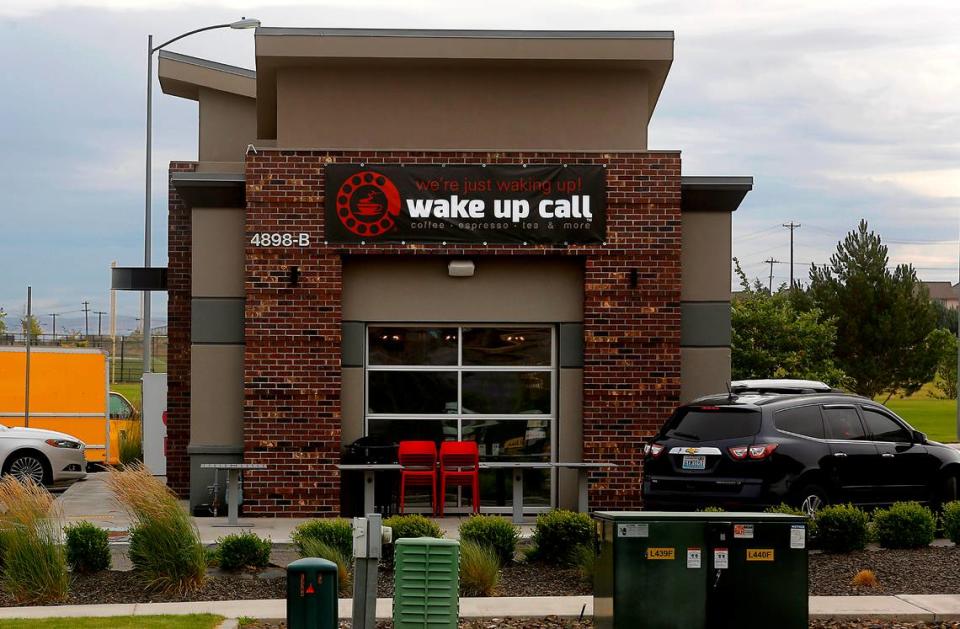 Temporary signs for the new Wake Up Call Coffee locations have started going up in the Tri-Cities.