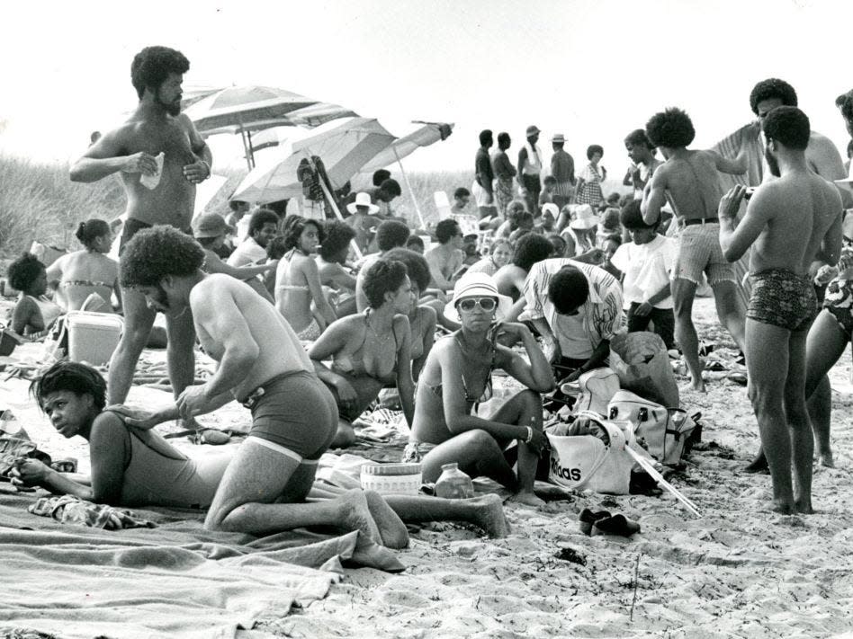 People lounge on the beach at Oak Bluffs in Martha's Vineyard in 1973