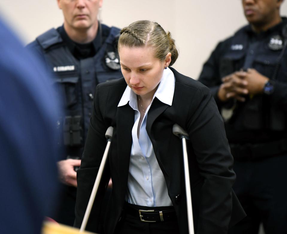 Deputy Shelby Eggers leaves the witness stand after her testimony at a Feb. 20 preliminary hearing for Kenneth DeHart.