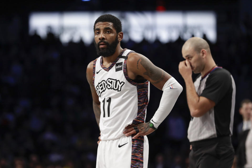 Brooklyn Nets' Kyrie Irving (11) reacts during the first half of an NBA basketball game against the Los Angeles Lakers Thursday, Jan. 23, 2020, in New York. (AP Photo/Frank Franklin II)