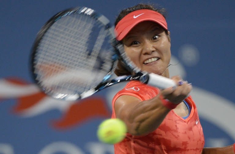 China's Li Na during her US Open match against Jelena Jankovic in New York on September 1, 2013. She beat Serbian ninth seed Jankovic 6-3, 6-0 to join the world number one Serena Williams in the last eight