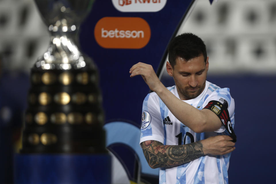 Lionel Messi adjusts his captain's armband before a Group A match between Argentina and Chile at Estadio Olímpico Nilton Santos as part of Copa America Brazil 2021 on June 14, 2021 in Rio de Janeiro, Brazil.