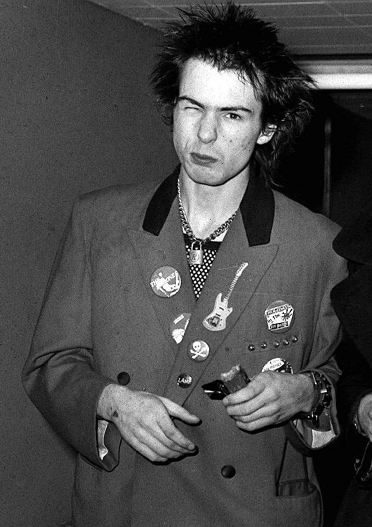 Sid Vicious at Heathrow airport in London – as the band walked to their aircraft, they hurled abuse at reporters and photographers (PA)