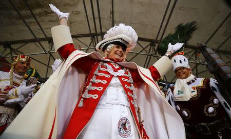 Carnival revellers celebrate during "Weiberfastnacht" (Women's Carnival) in Cologne, Germany February 23, 2017, marking the start of a week of street festivals with the highlight "Rosenmontag", Rose Monday processions. REUTERS/Wolfgang Rattay