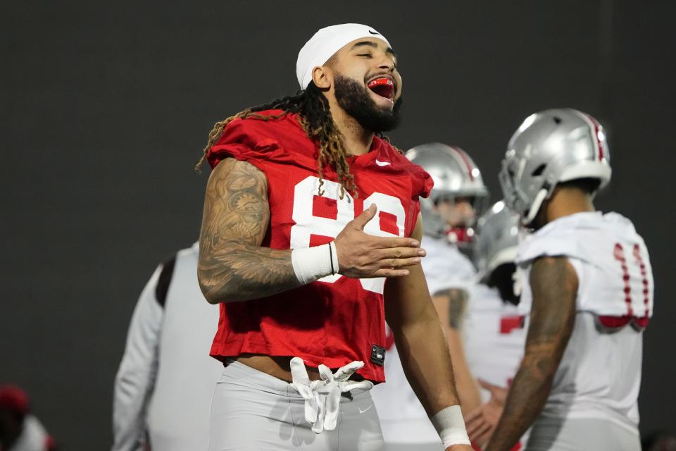 Mar 7, 2024; Columbus, OH, USA; Ohio State Buckeyes tight end Gee Scott Jr. (88) laughs during spring football practice at the Woody Hayes Athletic Center.