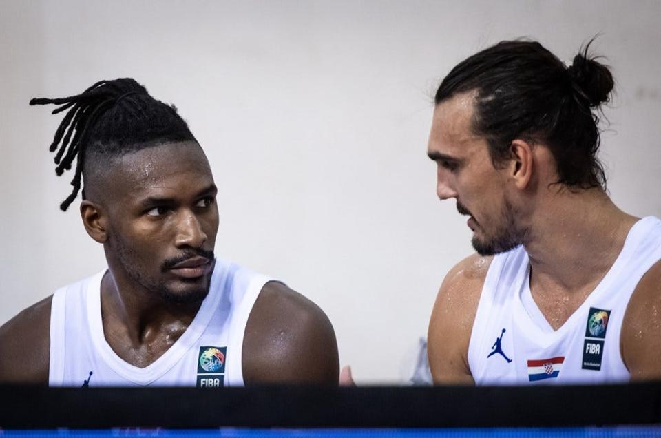 Dario Saric talks with Jaleen Smith during Croatia's comfortable victory over Switzerland.