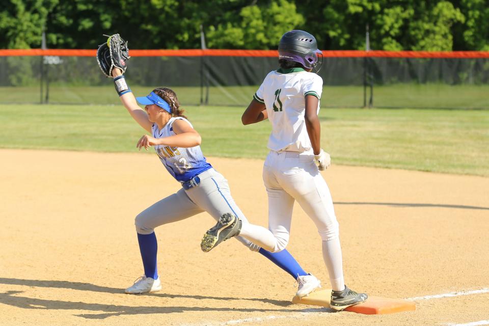 Lauren Eagan from Maine-Endwell makes the catch for an out ahead of runner Sanaiya Whitted of FDR during Maine-Endwell's  2-1 victory in a NYSPHSAA Class A softball regional semifinal May 30, 2023 at Union-Endicott.