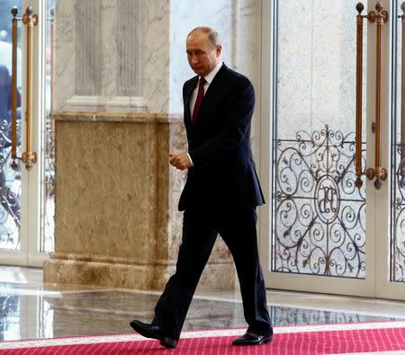 Russian President Vladimir Putin arrives to participate in the state council of the Union State of Russia and Belarus in Minsk, Belarus, June 19, 2018. REUTERS/Vasily Fedosenko