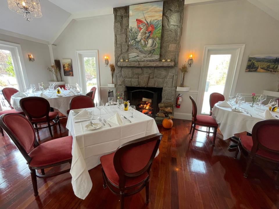 The wood burning fireplace at La Vista Ristorante Italiano in South Salem is the perfect backdrop for a meal, especially for the Caesar salad prepared tableside. Photographed Nov. 2023