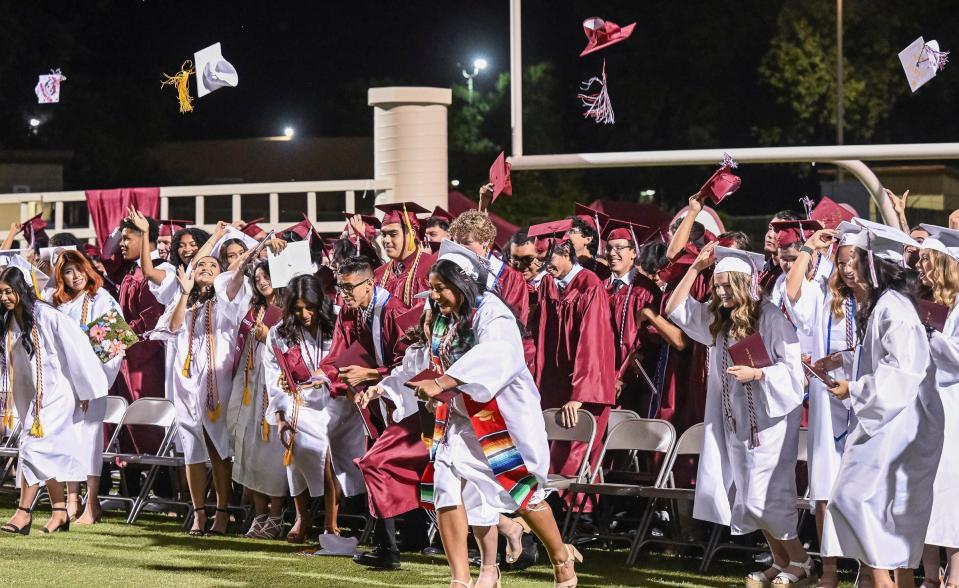 Mt. Whitney High School graduates celebrate after commencement ceremony at Mineral King Bowl for the Class of 2022 on Wednesday, June 1, 2022.