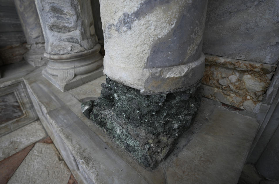 The damage at columns in St. Mark's Basilica's in Venice, Italy, is seen in this photo taken on Oct. 7, 2021. Lashing winds that pushed 1.87 meters (nearly 6 feet 2 inches) of water into Venice in November 2019 and ripped the lead tiles off St. Mark's Basilica for the first time ever shocked Venetians with the city's second-worst flood in history, but it was the additional four exceptional floods over the next six weeks that triggered fears about the impact of worsening climate change. (AP Photo/Antonio Calanni)