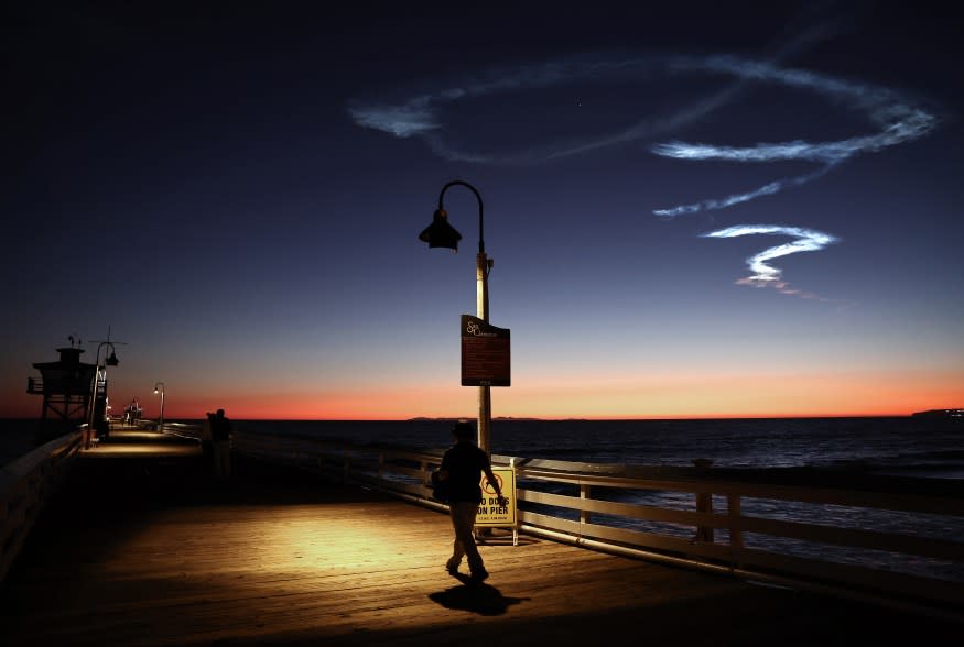 SpaceX Falcon 9 rocket launching 22 Starlink satellites into space, seen from San Clemente, California.