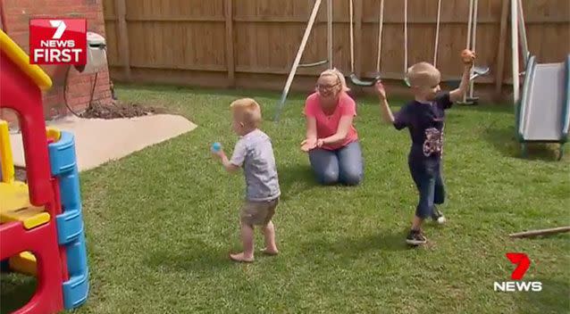 Playing outside with mum Louise and brother Jack. Source: 7News