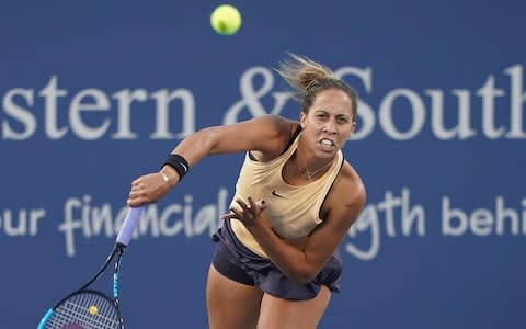 Madison Keys, of the United States, serves to Venus Williams - Credit: AP