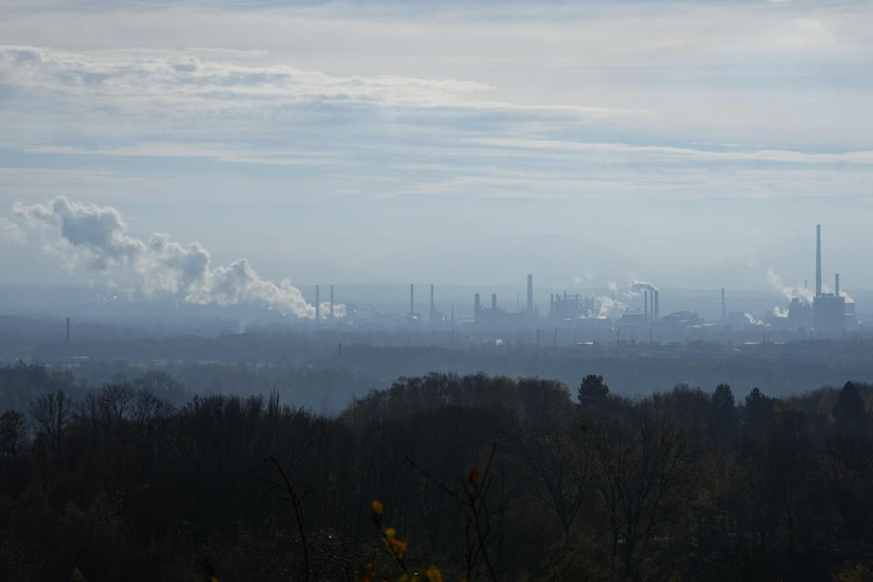 Smoke rises form chimneys of a steel plant in Ostrava, Czech Republic, Friday, Nov. 11, 2022. High energy prices linked to Russia's war in Ukraine have paved the way for coal’s comeback, endangering climate goals and threatening health from increased pollution. (AP Photo/Petr David Josek)