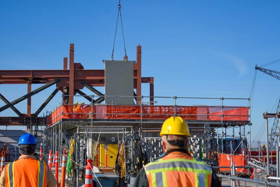 Some limited construction work is being done at the Hanford vitrification plant’s High Level Waste Facility, including lifting 16-ton carbon steel shield doors into the building