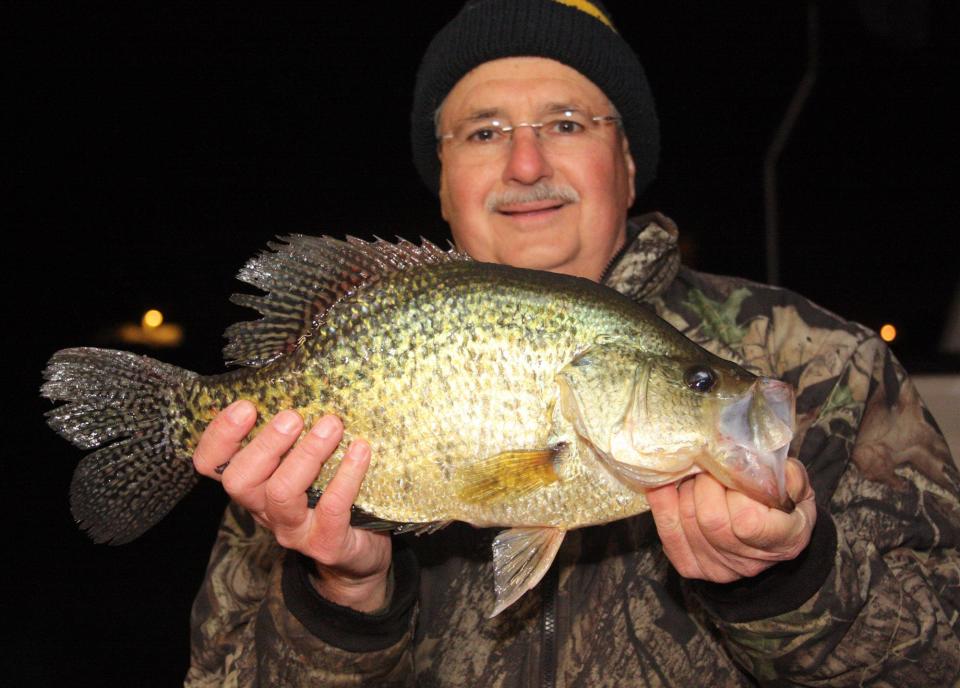 Conneaut Lake resident Dan Wielobob shows the monster crappie that he caught Friday, Feb., 12, 2021, at Lake Wilhelm. The fish weighed 4.02 pounds, not far off the state record of 4 pounds 2.88 ounces. 