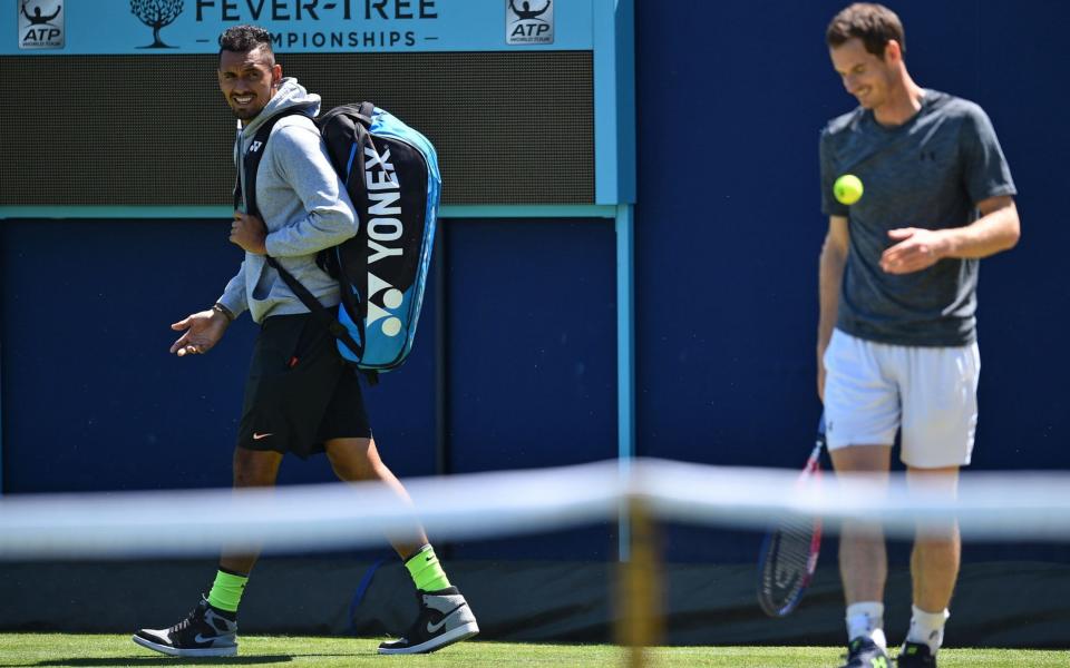 Nick Kyrgios (L) and Andy Murray face each other at Queen's on Tuesday - AFP