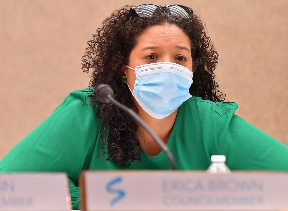 Spartanburg City Council member Erica Brown listens to members of the homeless community talk about the impact closing the center will have on them.
(Photo: ALEX HICKS JR./SPARTANBURG HERALD-JOURNAL)