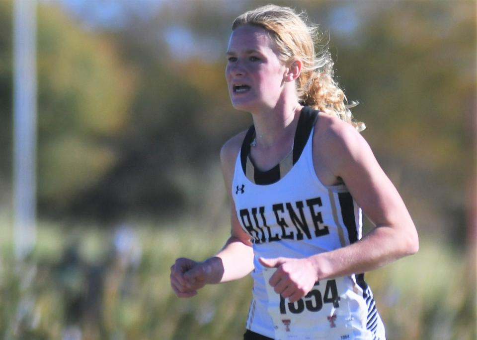 Abilene High's Zoe Vann competes in the Region I-5A cross country meet Tuesday at Mae Simmons Park in Lubbock.