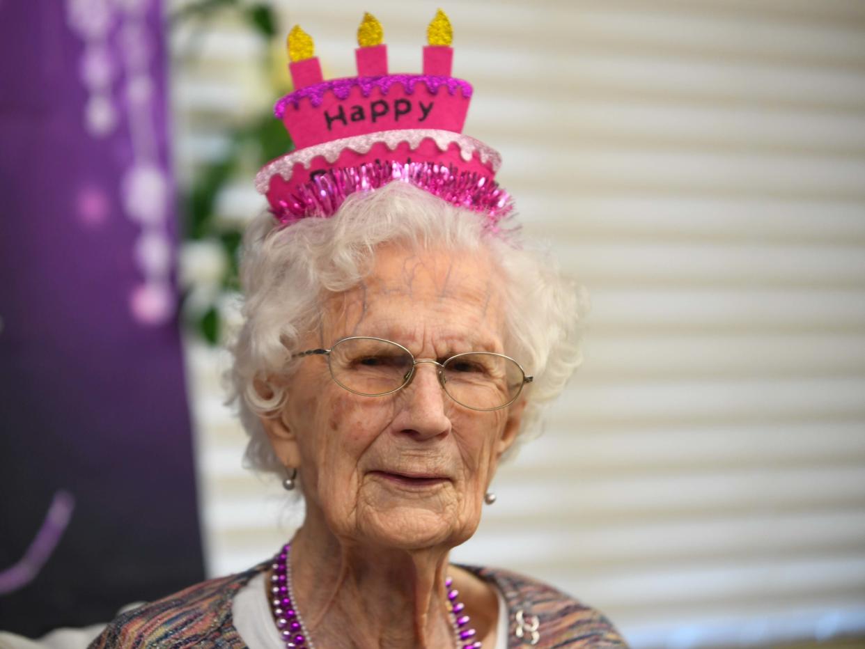 Claribel Herndon dons a birthday crown during a celebration of her upcoming 104th birthday inisde Brookdale Jackson Oaks in Jackson, Tenn., on Friday, Jan. 5, 2024.