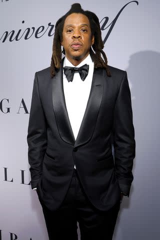 <p>Kevin Mazur/Getty for Roc Nation</p> Jay-Z attends the Shawn Carter Foundation 20th Anniversary Black Tie Gala in 2023.