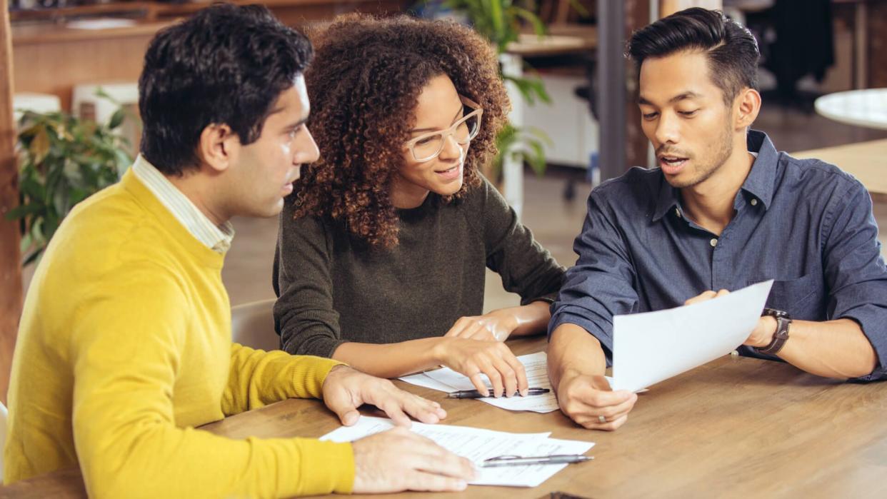 Couple on meeting with financial advisor.