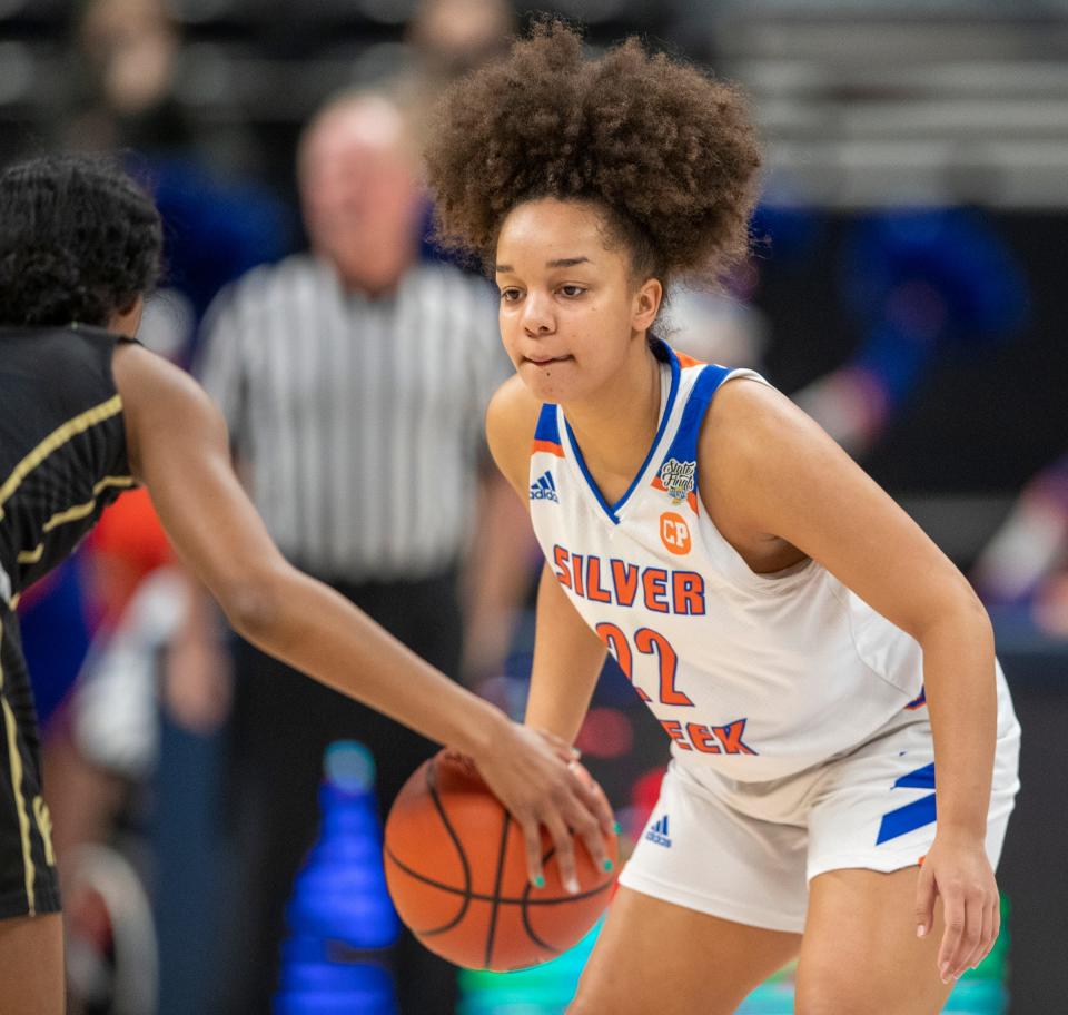 Silver Creek High School's Alana Striverson (4) defends on Saturday, Feb. 27, 2021, during the girls Class 3A basketball finals from Bankers Life Fieldhouse in Indianapolis. 