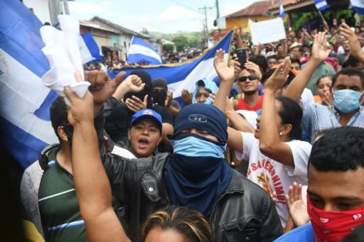 Residents of Masaya, which has become a flashpoint during the two months of unrest in Nicaragua, celebrate the arrival of the bishops