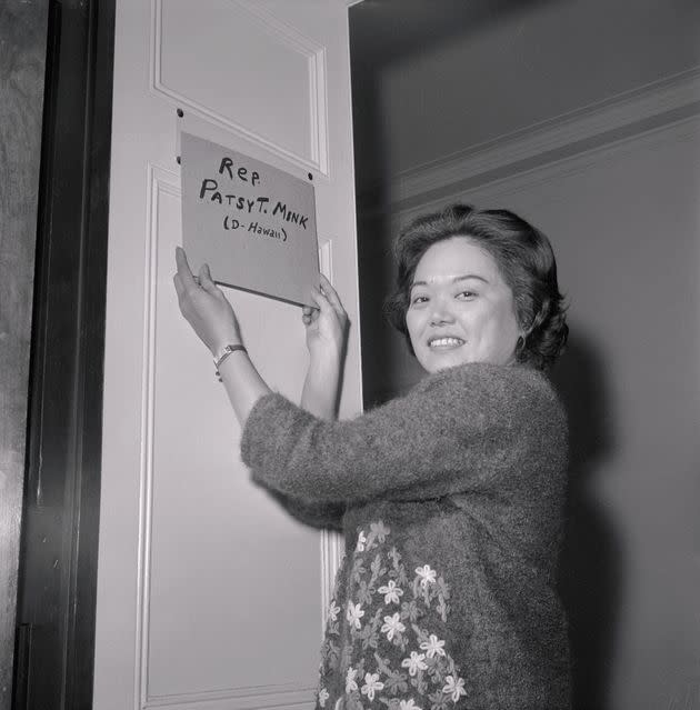 Patsy Mink puts a homemade nameplate on the door of her office after being elected to the 89th Congress.  (Photo: Bettmann via Getty Images)