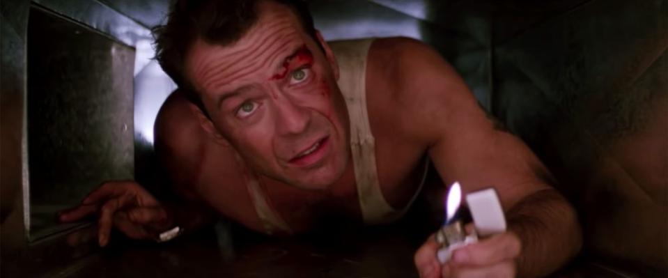 Bruce Willis in <em>Die Hard </em>