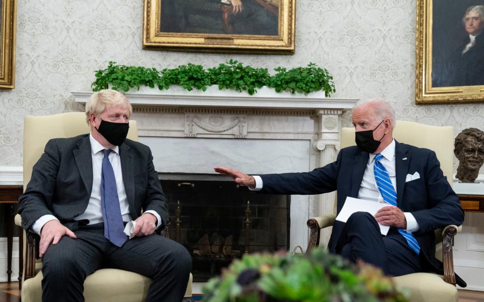 Boris Johnson holds a bilateral meeting with Joe Biden in the Oval Office of the White House - Alex Brandon/AP
