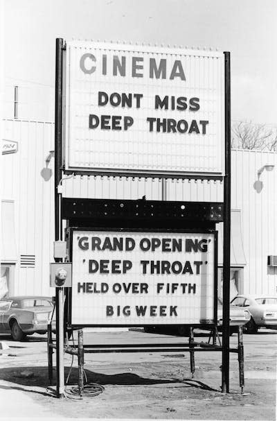 ‘Deep Throat’ brought porn into the mainstream. <a href="https://www.gettyimages.com/detail/news-photo/theater-marquee-advertises-the-film-deep-throat-starring-news-photo/2884111?phrase=deep%20throat&adppopup=true" rel="nofollow noopener" target="_blank" data-ylk="slk:Arnie Sachs/CNP via Getty Images;elm:context_link;itc:0;sec:content-canvas" class="link ">Arnie Sachs/CNP via Getty Images</a>