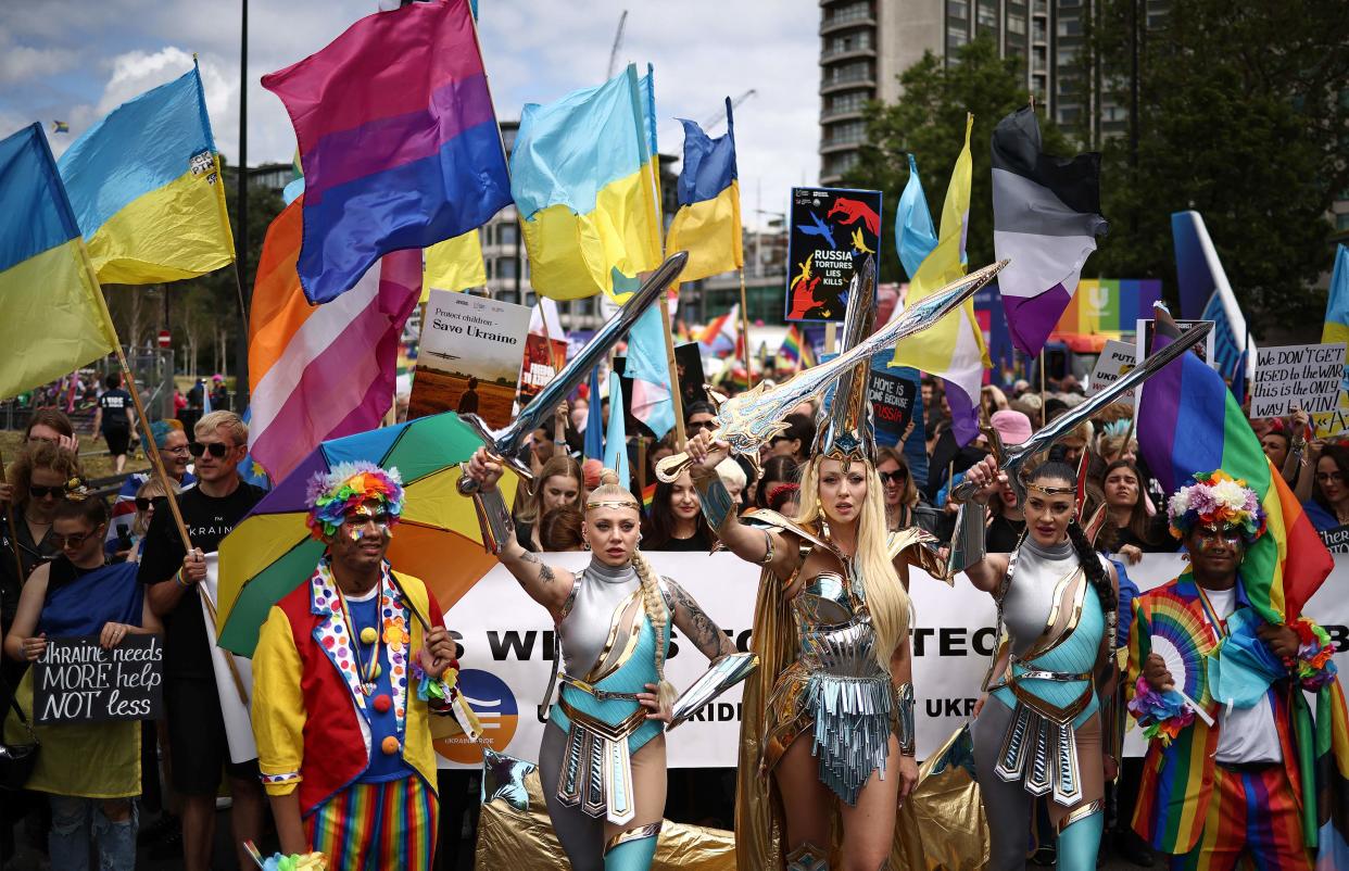 Members of the LGBT+ community take part in the annual Pride Parade in the streets of London (AFP via Getty Images)