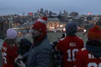 People gather at the Liberty Memorial as they wait for a parade through downtown Kansas City, Mo. to celebrate the Kansas City Chiefs victory in NFL's Super Bowl 54 Wednesday, Feb. 5, 2020. (AP Photo/Charlie Riedel)