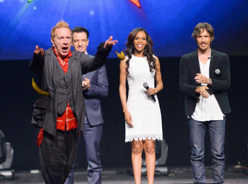 From left, singer John Rotten Lydon throws bananas at the media, JC Chasez, Michelle Williams and Brandon Boyd look on, at the "Jesus Christ Superstar" arena spectacular press conference and press performance to announce a North American arena tour on Friday, April 4, 2014, in New York. (Photo by Evan Agostini/Invision/AP)