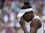 Venus Williams of the U.S.A. reacts during her match against Serena Williams of the U.S.A. at the Wimbledon Tennis Championships in London, July 6, 2015. REUTERS/Toby Melville