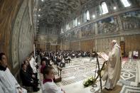 Pope Francis leads a mass where 32 babies were baptized in the Sistine Chapel at the Vatican January 12, 2014, in this handout courtesy of Osservatore Romano. REUTERS/Osservatore Romano/Handout via Reuters (VATICAN - Tags: RELIGION) ATTENTION EDITORS - THIS IMAGE WAS PROVIDED BY A THIRD PARTY. FOR EDITORIAL USE ONLY. NOT FOR SALE FOR MARKETING OR ADVERTISING. THIS PICTURE IS DISTRIBUTED EXACTLY AS RECEIVED BY REUTERS, AS A SERVICE TO CLIENTS. NO SALES. NO ARCHIVES