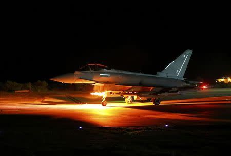 A British Royal Air Force Typhoon leaves for a mission from RAF Akrotiri in southern Cyprus December 4, 2015. REUTERS/Darren Staples