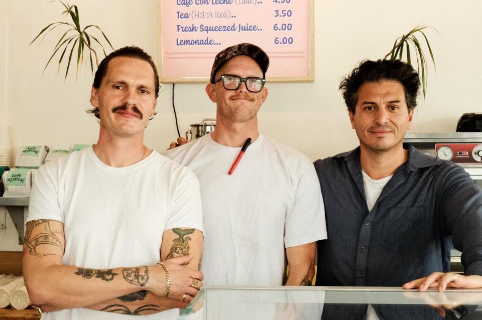 Three men behind the Cafe Tropical counter from left: Danny Khorunzhiy, Ed Cornell and Rene Navarrette.