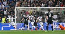 Juventus' Alvaro Morata (L) scores their first goal Reuters / Stefano Rellandini