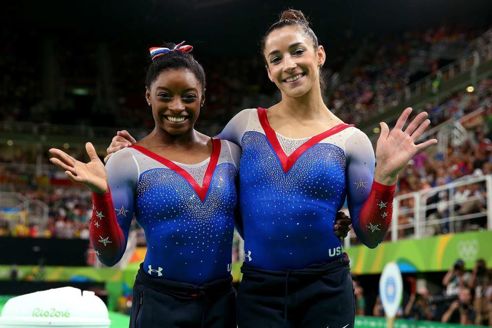 <p>Alex Livesey/Getty Images</p> Simone Biles and Aly Raisman