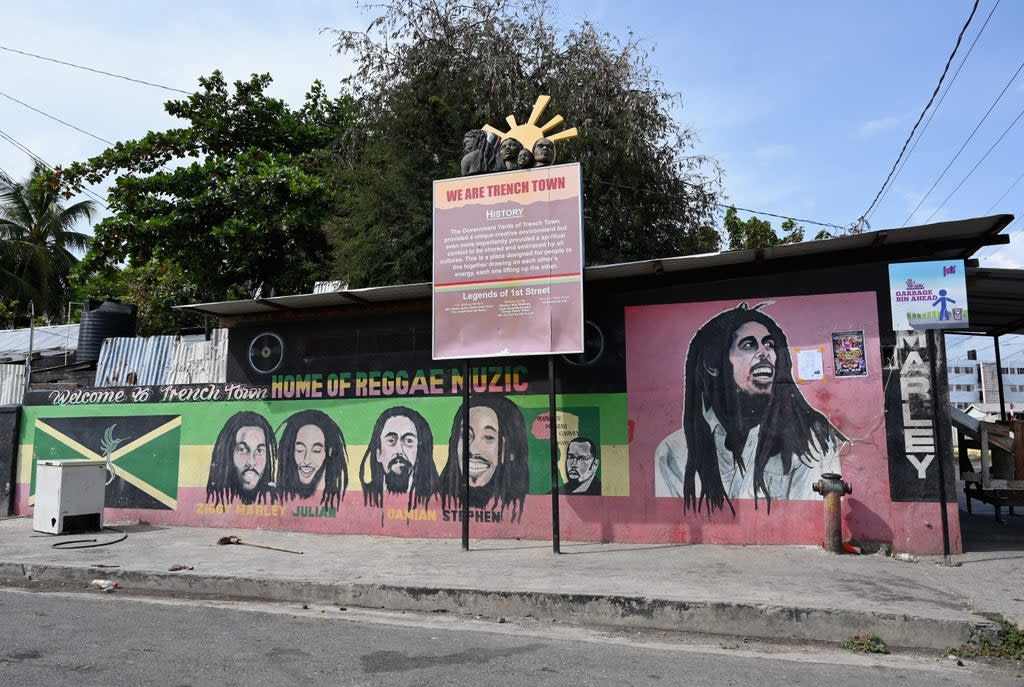 A mural of Bob Marley and his sons adorns the Trench Town neighborhood of Kingston, Jamaica (AFP via Getty Images)