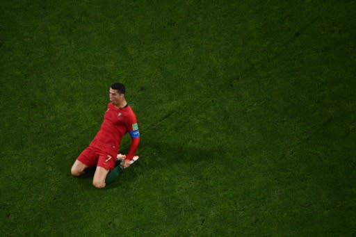 Ronaldo celebrates after scoring one of his three goals against Spain to become only the fourth player to score in four World Cups