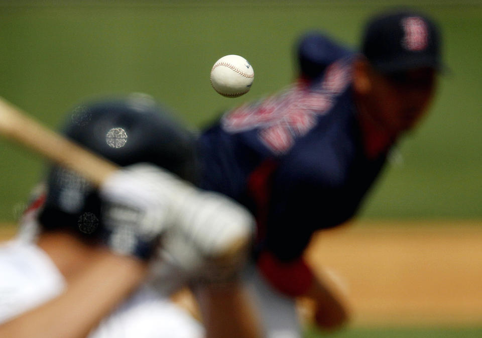 <p>Boston Red Sox starting pitcher Daisuke Matsuzaka, right, of Japan, pitches to Detroit Tigers’ Scott Sizemore during the fifth inning of a spring training baseball game, March 15, 2011 in Lakeland, Fla. (AP Photo/David Goldman) </p>