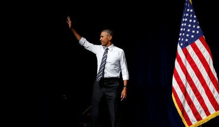 U.S. President Barack Obama waves as he arrives to speak at a fundraiser for Washington Governor Jay Inslee in Seattle, June 24, 2016. REUTERS/Kevin Lamarque