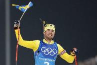 Biathlon - Pyeongchang 2018 Winter Olympics - Men's 4x7.5 km Relay Final - Alpensia Biathlon Centre - Pyeongchang, South Korea - February 23, 2018 - Fredrik Lindstroem of Sweden reacts. REUTERS/Murad Sezer