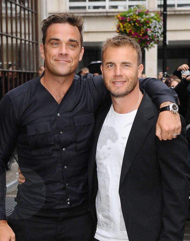 Gary Barlow and Robbie Williams At Radio 1 – London